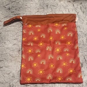 Rust Red Wet Bag with Sun and Rainbow Pattern Double Zippered Pocket